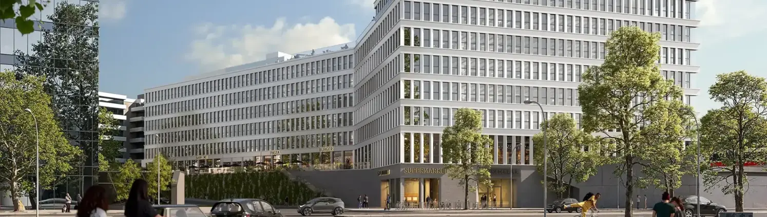 Neubau-Quartier The Friedenauer in Berlin-Friedenau: Zehnstöckiges Eckgebäude mit Staffelgeschossen und großen Fensterfronten.